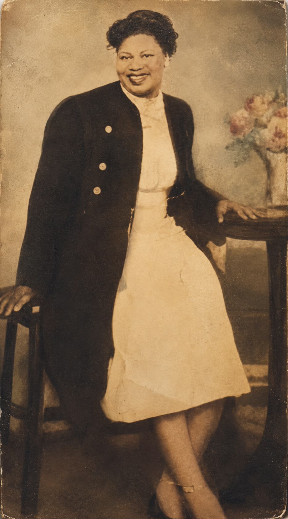 A portrait of the grandmother who inspired the House — her warmth, elegance, and quiet permanence.