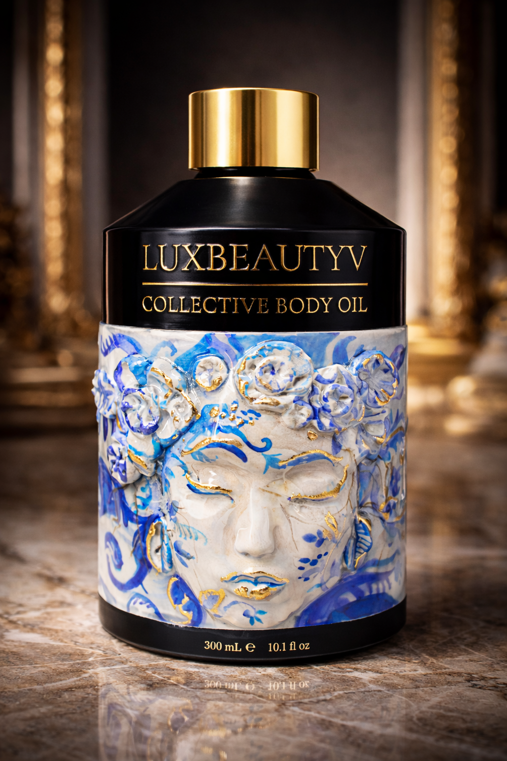 The Collective porcelain face flacon — hand-finished in blue and gold, with a sculpted female face.